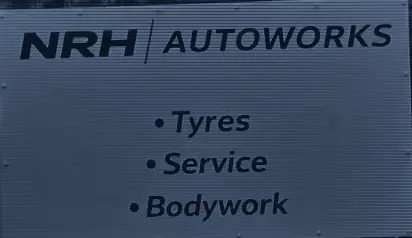 The NRH Autoworks sign outside the garage on Windsor Road, Bray